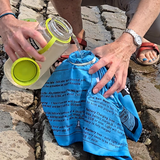 Using H2gO Purifier bandana to strain sediment from the water